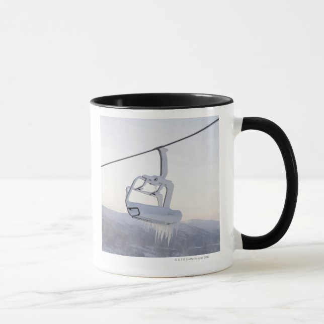 Chair lift full of snow and ice mug (Right)