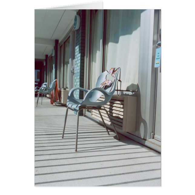Chairs Outside Beach Hotel Rooms (Front)