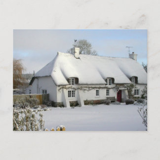 Chalet à chaume dans la carte postale