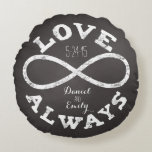 Chalkboard Infinity Love Wedding Date and Names Round Pillow<br><div class="desc">Celebrate the infinite love between your favourite bride and groom with this customizable round pillow! A white chalk infinity symbol and “Love Always” text surrounds a couple's names and wedding date on a black chalkboard background. Makes a beautiful,  modern,  personalized gift for newlyweds.</div>