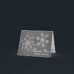 Chalkboard Snowflake Wedding Thank You Note Cards<br><div class="desc">Beautiful snowflake wedding thank you cards with two pretty snowflakes with a leaf and floral design and heart shaped snow and ice reflections inside the thank you note. Pretty chalkboard background in different shades of grey. Perfect for a winter wonderland holiday or Christmas themed wedding. It can be personalized with...</div>
