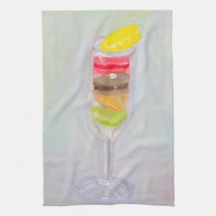 Champagne et serviette de cuisine de macarons