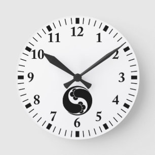 Changed shape two clove swirls round clock