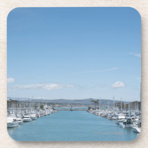 channel in harbour on a sunny day with blue sky coaster
