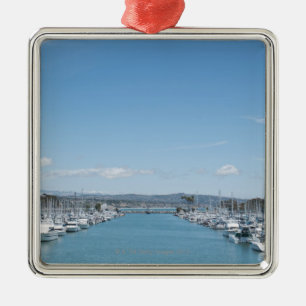 channel in harbour on a sunny day with blue sky metal ornament