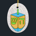 Chanukah Dreidel Ceramic Ornament<br><div class="desc">Have fun with these. Think themes! Play with background colours, add or delete text, and (for a bit of an extra fee) customize the back with images, colour, your logo / business info., etc.! These are also great for gifts or to use as the finishing touch of class on your...</div>