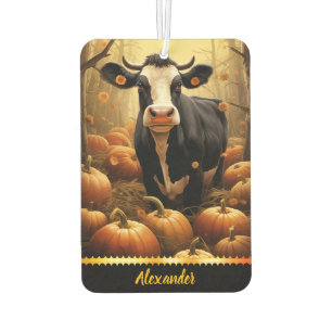 Charming cow among pumpkins on a golden autumn day air freshener
