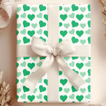 Charming Green Hearts on White Wrapping Paper<br><div class="desc">Celebrate love and affection with this charming green hearts on white wrapping paper. The design features an array of green hearts in various shades, beautifully scattered across a crisp white background. Ideal for Valentine's Day, anniversaries, weddings, or any heartfelt occasion, this wrapping paper adds a touch of sweetness and elegance...</div>