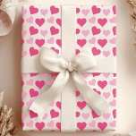 Charming Pink Hearts on White Wrapping Paper<br><div class="desc">Celebrate love and affection with this charming pink hearts on white wrapping paper. The design features an array of pink hearts in various shades, beautifully scattered across a crisp white background. Ideal for Valentine's Day, anniversaries, weddings, or any heartfelt occasion, this wrapping paper adds a touch of sweetness and elegance...</div>