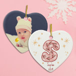Charming Pink Star Pattern Ceramic Ornament<br><div class="desc">Celebrate your baby girl's first Christmas with a delightful pink star design adorned with golden accents. Personalize it with her name and the year, creating a keepsake full of love. Add a cherished photo on the back to capture a precious memory. Let it sparkle and shine, bringing warmth to any...</div>