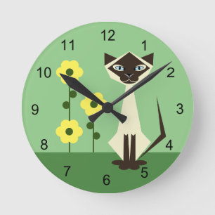 Chat assis Abstrait et horloge ronde verte à fleur