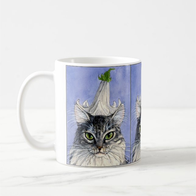 Chat avec la tasse de casquette de lis (Gauche)