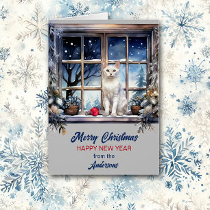 Chat blanc dans la fenêtre de Noël