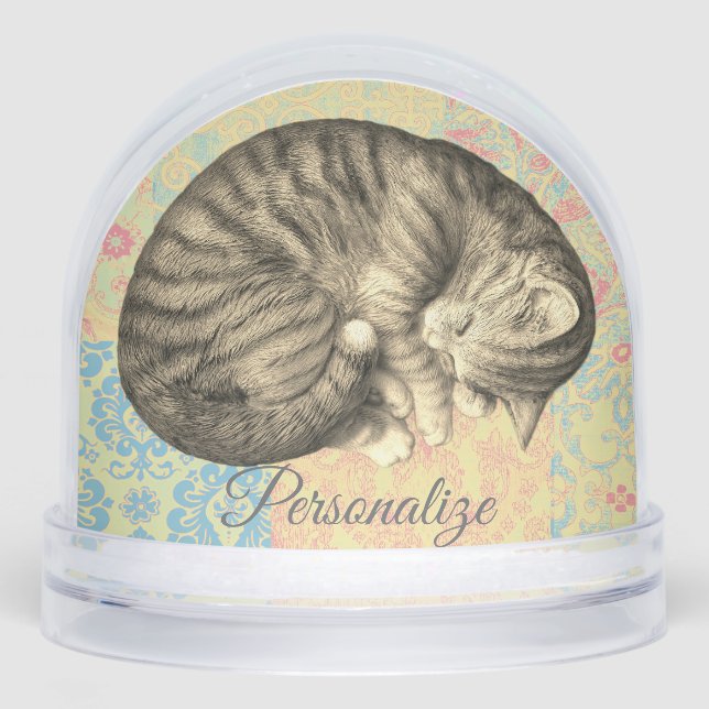 Chat courbé dormant sur la courtepointe mignon dou (Avant)