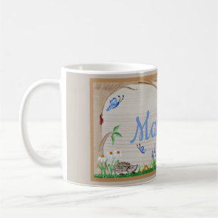 Chat dans la tasse de jardin
