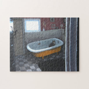 Chat dans le puzzle de baquet