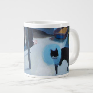 Chat de Betsy dans la tasse de cône