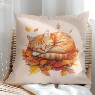 Chat de gingembre couché douillet Coussin souple