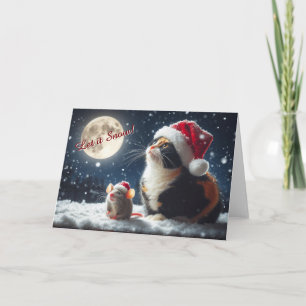 Chat et souris regardent la carte de Noël de neige