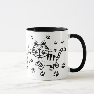 Chat et tasse mignons d'empreintes de pattes