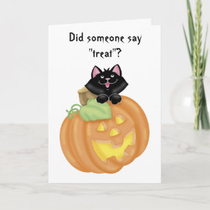 Chat mignon dans la carte de voeux découpée de