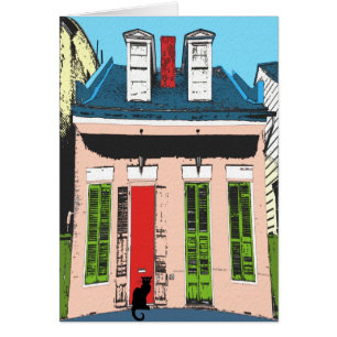 Chat noir au cottage rose