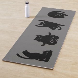 Chat noir mignon faisant design de yoga, tapis de