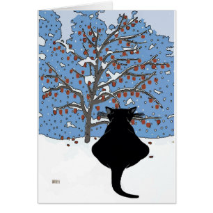 Chat noir observant la neige