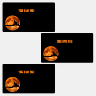 Chat noir sous Orange Moon Étiquette retour