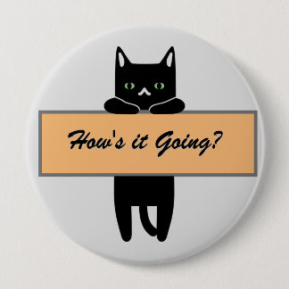Chat tenant un badge de signe