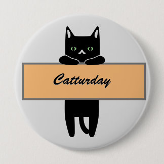 Chat tenant un badge de signe