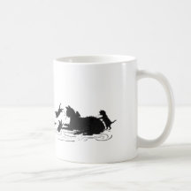 Chats avec la tasse de chatons