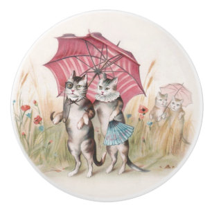 Chats dans le bouton décoratif mignon d'amour