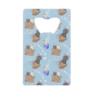 Chats en boîte et gouttes de lait sur bleu