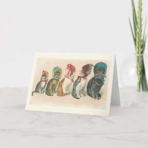 Chats vintages portant la carte de note de capots