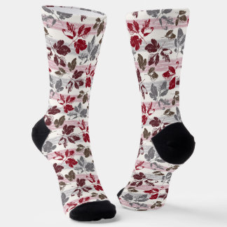 Chaussette Feuilles multicolores sur un fond rayé.