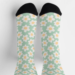 Chaussette Fleurs de style rétro sur arrière - plan vert