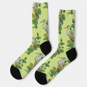 Chaussette Héron dans le jardin de lotus jaune sur rosée de m