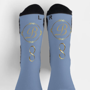 Chaussette Monogramme en or avec cercle infini sur bleu  