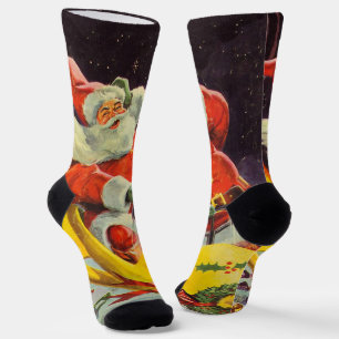 Chaussette Noël vintage, le Père Noël dans un vaisseau spatia
