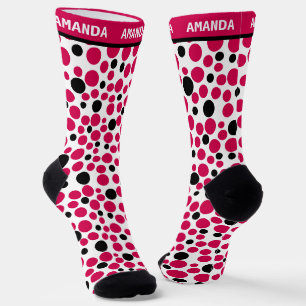 Chaussette pois noir rouge rétro sur arrière - plan blanc