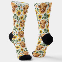 Vaches Highland et fleurs de tournesol jaune