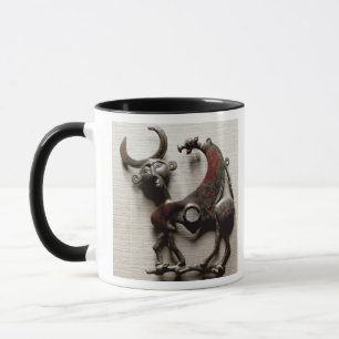 Cheek piece of a horse bit in the form of a human- mug