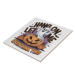 Cheerful Halloween ghost atop a carved pumpkin Tile