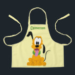Cheerful Pluto Puppy Graphic Apron<br><div class="desc">Brighten up your day with this endearingly expressive and joyful Pluto graphic! Featuring a front-facing, seated pose with a playful head tilt and a happy "tongue-out" expression, this design captures the essence of pure, friendly energy. The bold gold and orange tones are complemented by a vibrant green collar, creating a...</div>