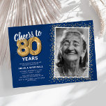 Cheers to Eighty Years 80th Birthday Photo Invitation<br><div class="desc">Elegant eightieth birthday party invitation featuring a trendy blue background that can be changed to any colour,  a photo of the birthday girl / boy,  gold sparkly glitter,  eighty gold hellium balloons,  and a modern 80th birthday celebration text template that is easy to personalize.</div>