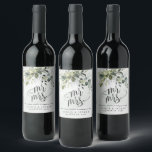 Cheers to Love Laughter Happily Ever After Wedding Wine Label<br><div class="desc">Design features a bouquet of watercolor greenery, eucalyptus and a succulent over a dusty blue watercolor splash. Design also features specks of painted (printed) gold and green. Mr and Mrs is printed in a unique design. Cheers to love, laughter & happily ever after is printed below the Mr & Mrs...</div>