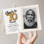 Cheers to Seventy Years 70th Birthday Photo Invitation<br><div class="desc">Elegant seventieth birthday party invitations featuring a simple white background that can be changed to any colour,  a photo of the birthday girl / boy,  gold sparkly glitter,  seventy gold hellium balloons,  and a modern 70th birthday celebration text template that is easy to personalize.</div>