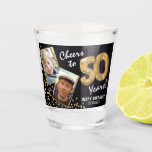 Cheers to the Years 50th Birthday 2 Photo Shot Glass<br><div class="desc">Celebrating the BIG 50! These shot glasses allow you to upload a before and after photograph of the birthday man or woman in a faux gold frame, with the title 'Cheers to 50 Years!'. Featuring a rustic chalkboard background, faux gold number 50 helium balloons, faux gold glitter confetti, a Happy...</div>