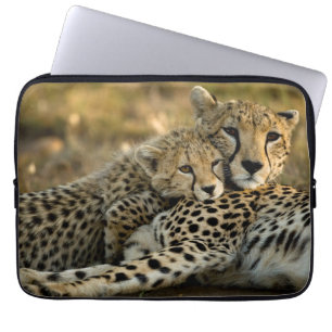 Cheetah Cub Snuggling with its Mom Laptop Sleeve